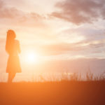 woman praying alone